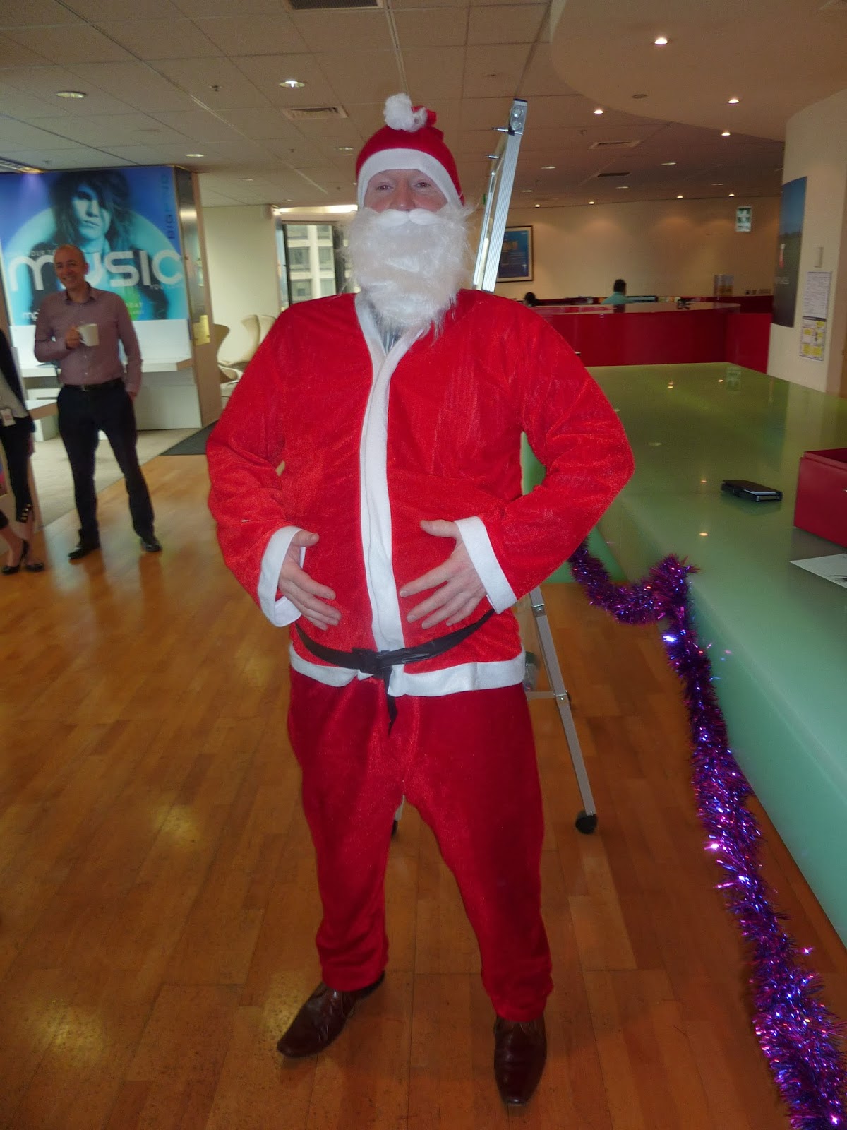 Boss dressed as santa