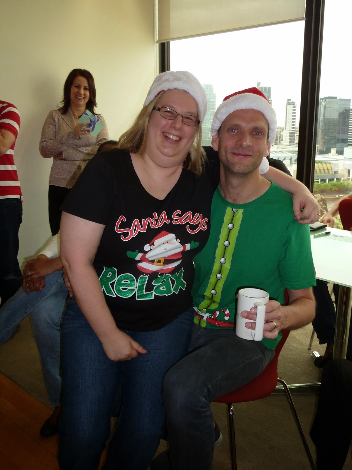 Em and Wayne in Christmas shirts