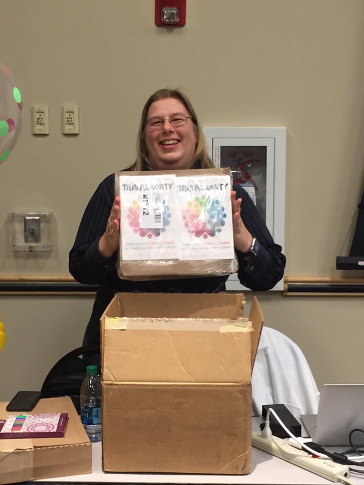 Me unboxing the very first box of books.